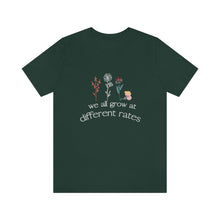 Load image into Gallery viewer, We all grow at different rates T-Shirt
